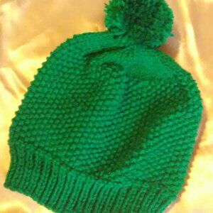 green seed stich knitted beanie with pompom